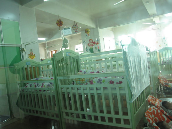 An Infant Room at the Wuhan Municipal Children's Welfare Institute.