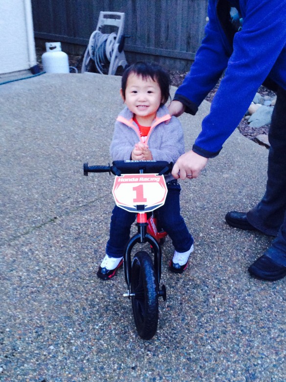 Roxy liked her birthday present, A Honda Strider Bike