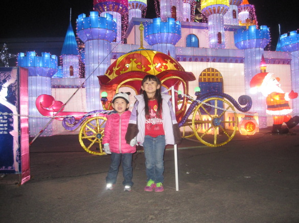 Roxy and her friend standing in front of the castle