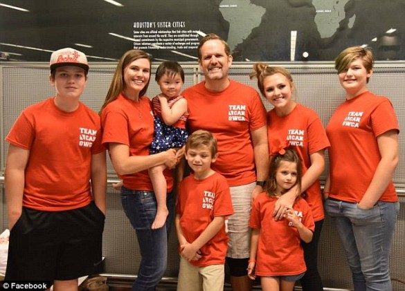 The Shook family with Lucy, the special needs orphan they decided to adopt