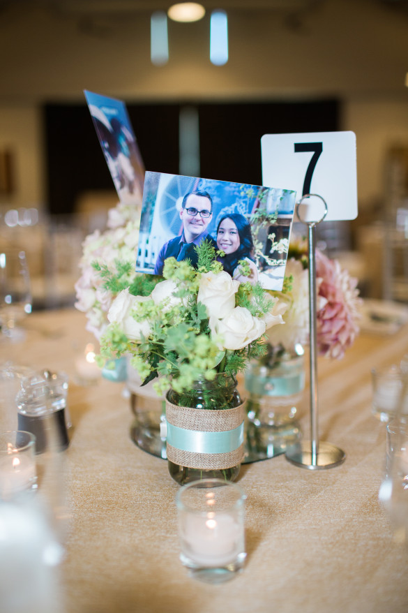 The tables with centerpieces handmade by Daisy M Productions