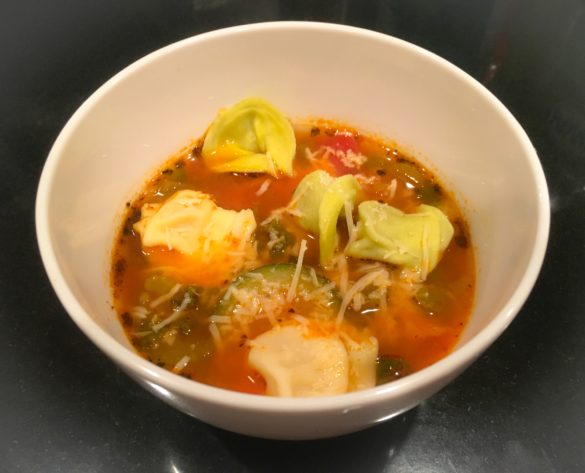 Instant Pot Turkey Vegetable Tortellini Soup With Shredded Parmesan Cheese On Top