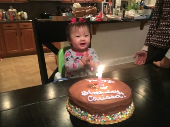Carissa with her 1st birthday cake